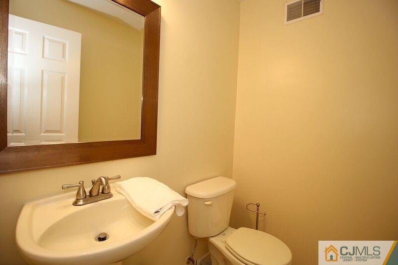 44 Cannon Road Old Bridge, NJ 08857 - Photo 13 of 24 a bathroom with a sink mirror and toilet