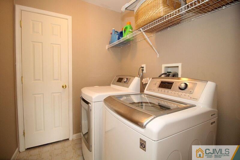 44 Cannon Road Old Bridge, NJ 08857 - Photo 19 of 24 a utility room with dryer and washer