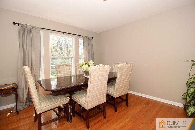 44 Cannon Road Old Bridge, NJ 08857 - Photo 7 of 24 a dining room with furniture and wooden floor