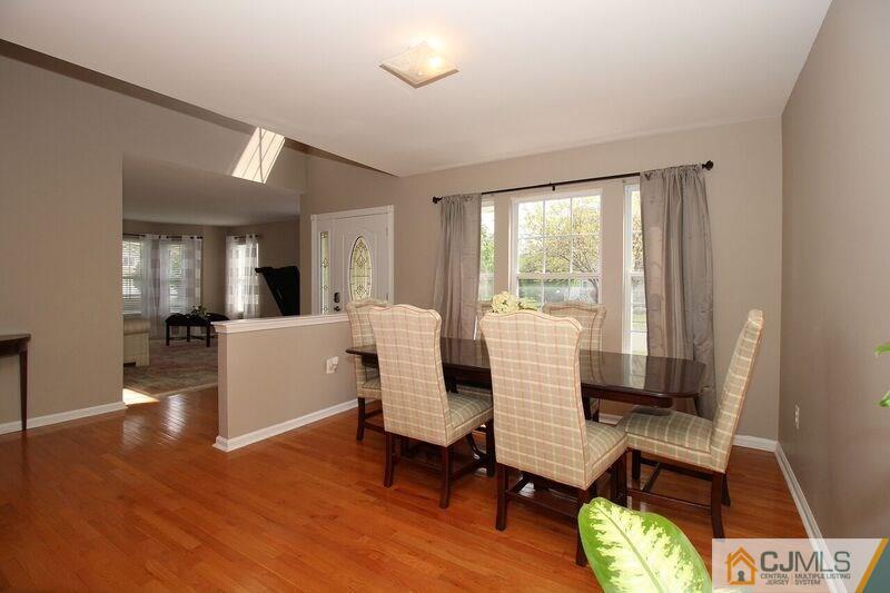 44 Cannon Road Old Bridge, NJ 08857 - Photo 8 of 24 a living room with furniture and a wooden floor