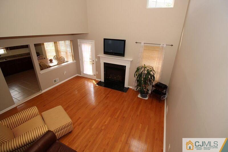 44 Cannon Road Old Bridge, NJ 08857 - Photo 9 of 24 a room with furniture and a fireplace