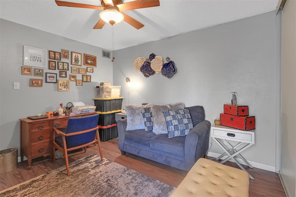 5624 Boca Raton Boulevard, Unit 133 Fort Worth, TX 76112 - Photo 11 of 19 a living room with furniture and a window