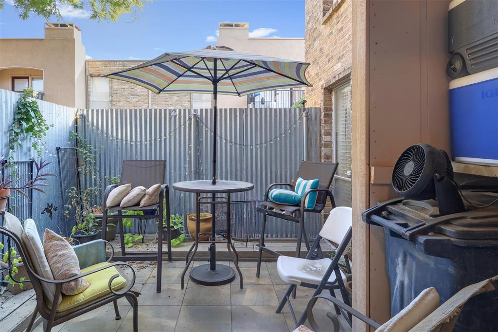 5624 Boca Raton Boulevard, Unit 133 Fort Worth, TX 76112 - Photo 13 of 19 a view of a chairs and table in backyard
