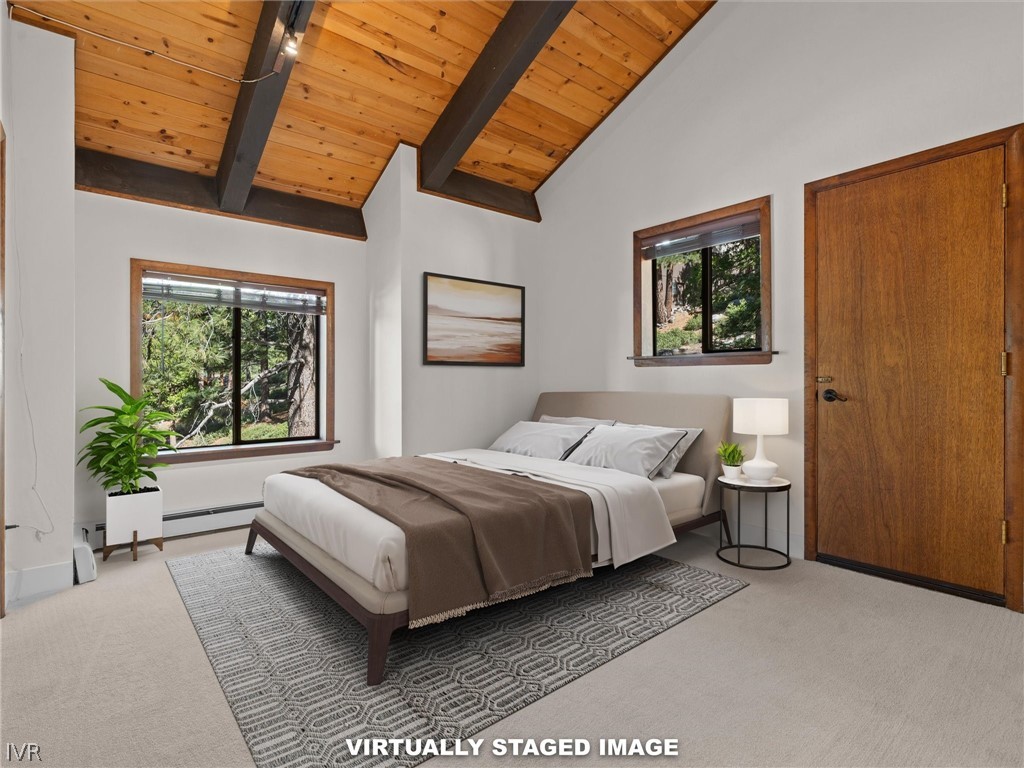 1106 Altdorf Terrace Incline Village, NV 89451 - Photo 10 of 50 a spacious bedroom with a bed lamp and a large window