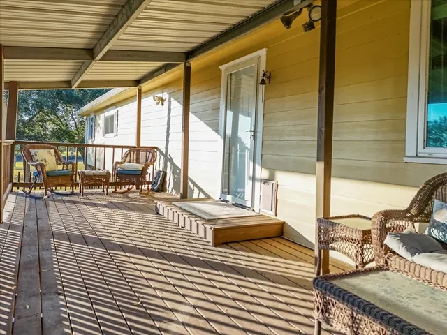 a kitchen with stainless steel appliances granite countertop a refrigerator and a stove