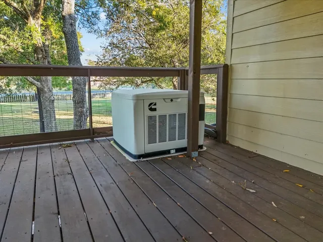 a swimming pool with outdoor seating and yard