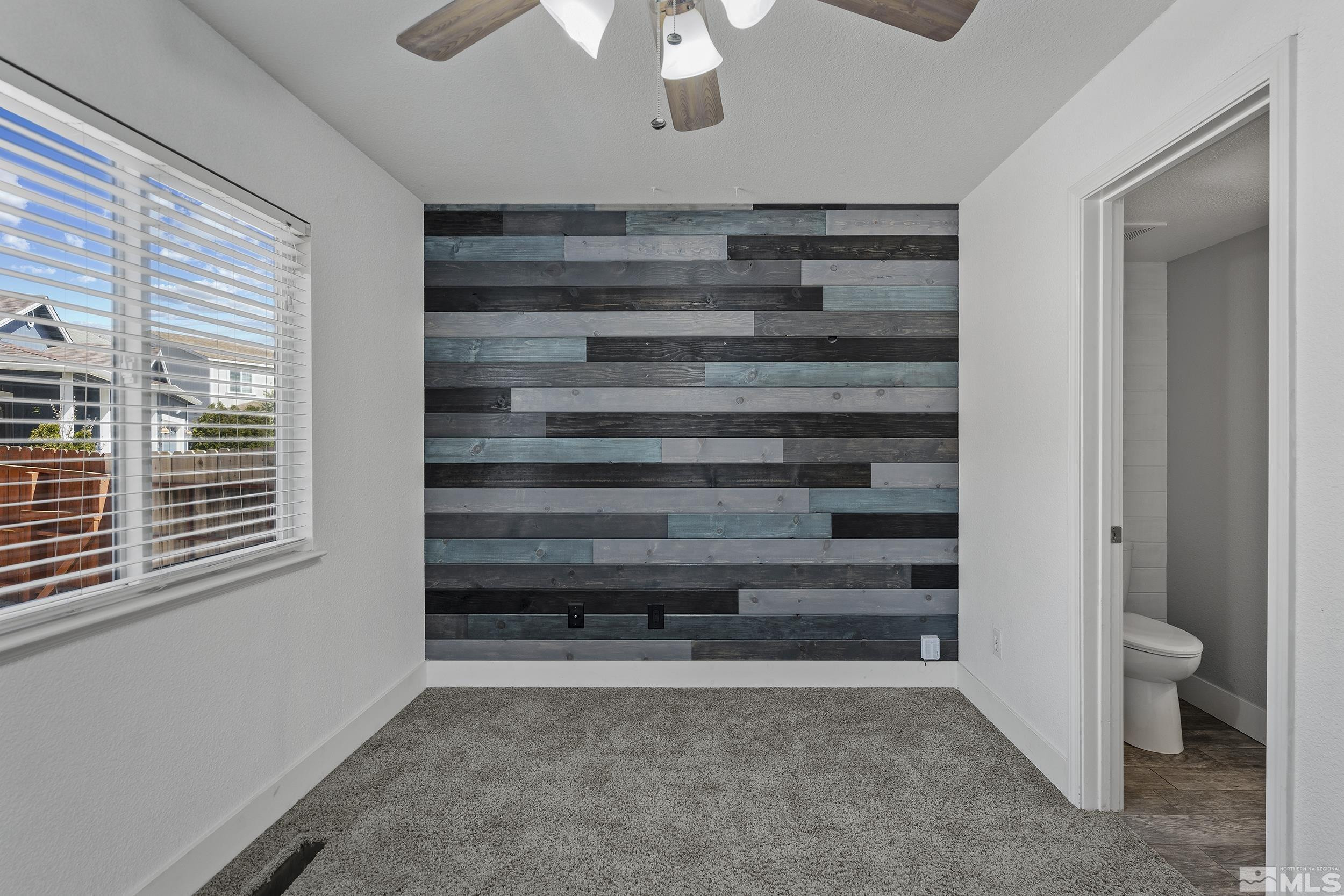 17940 Drift Creek Court Reno, NV 89508 - Photo 12 of 26 a view of closet area with empty racks