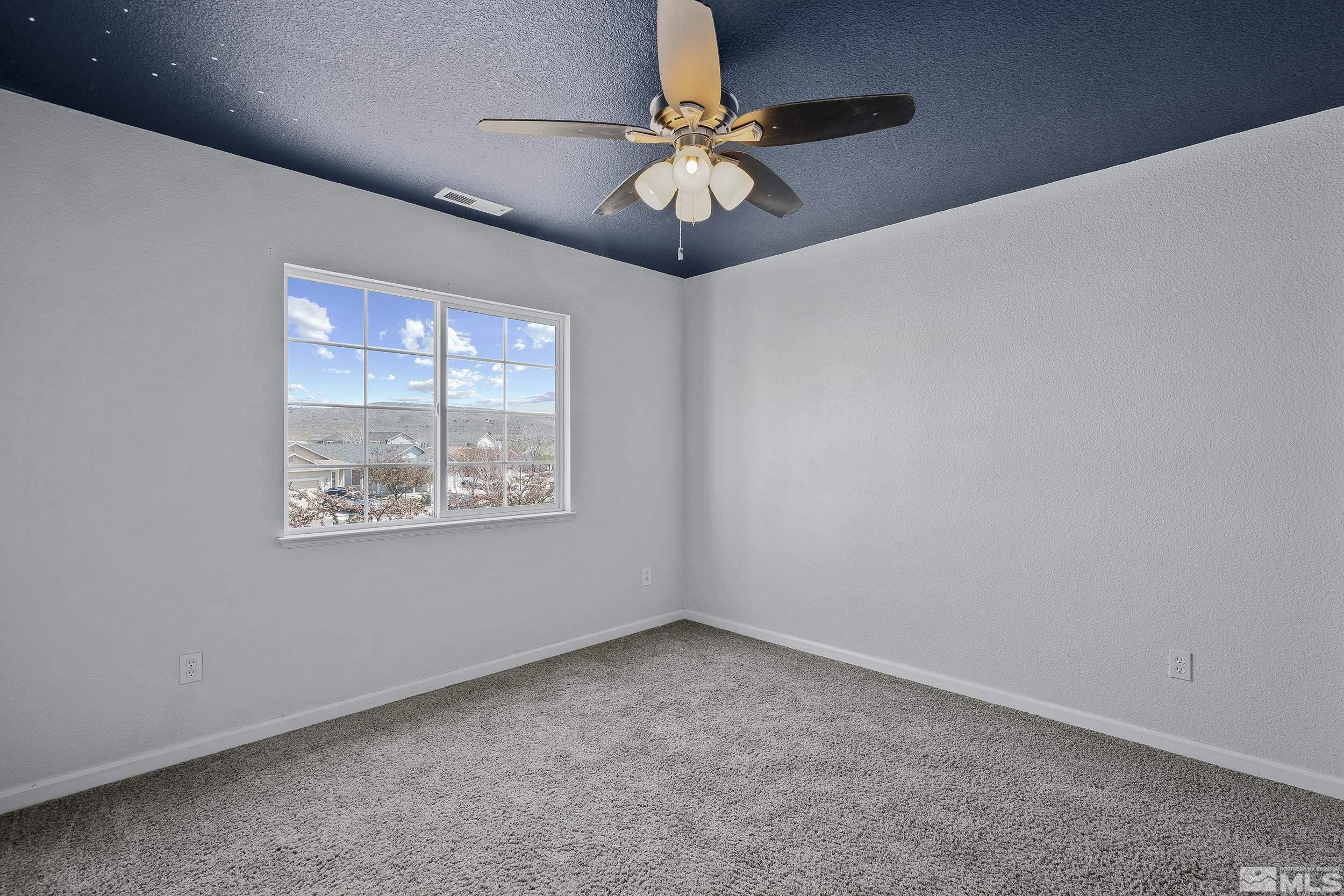 17940 Drift Creek Court Reno, NV 89508 - Photo 18 of 26 a view of an empty room with a window