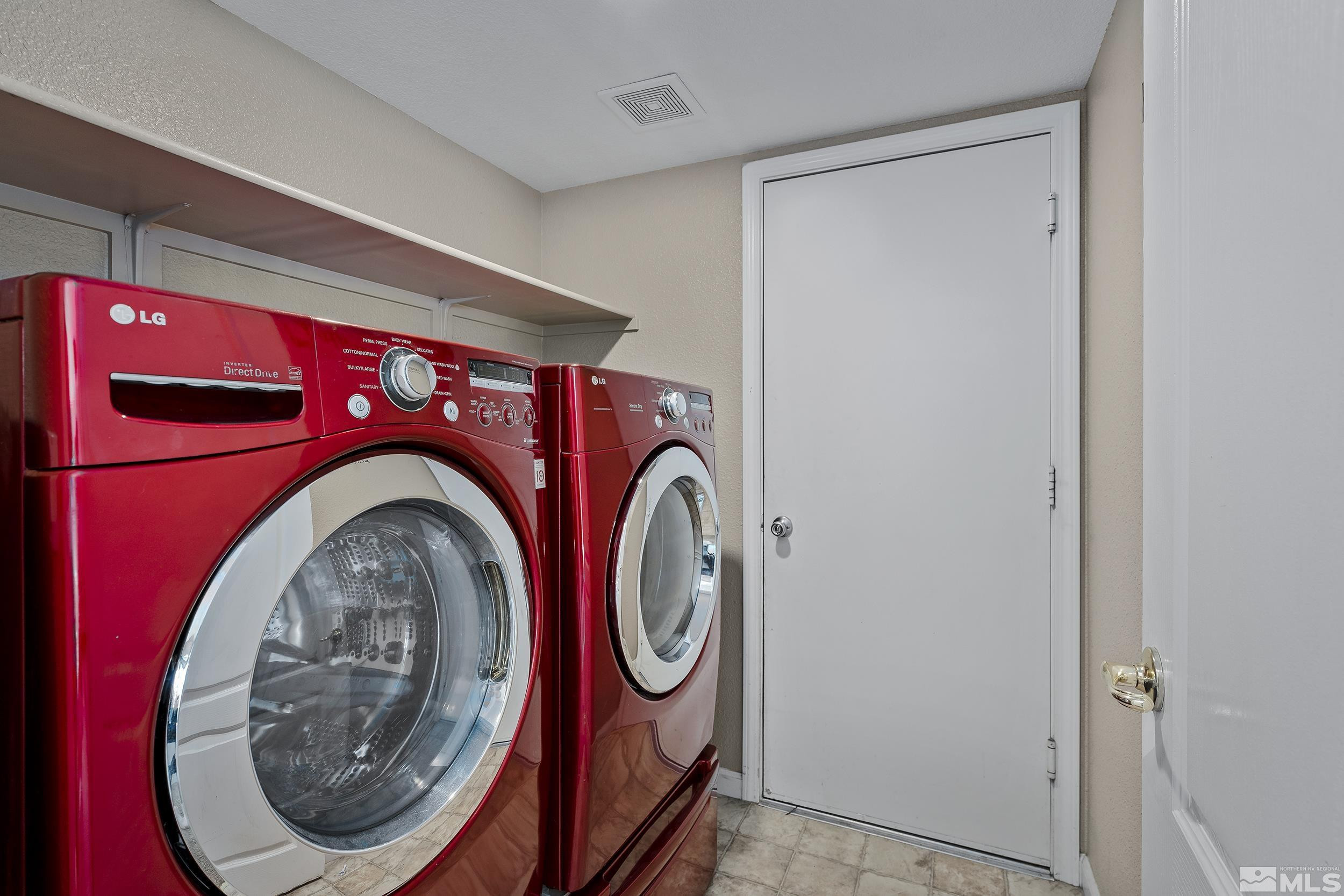 17940 Drift Creek Court Reno, NV 89508 - Photo 21 of 26 a utility room with dryer and washer