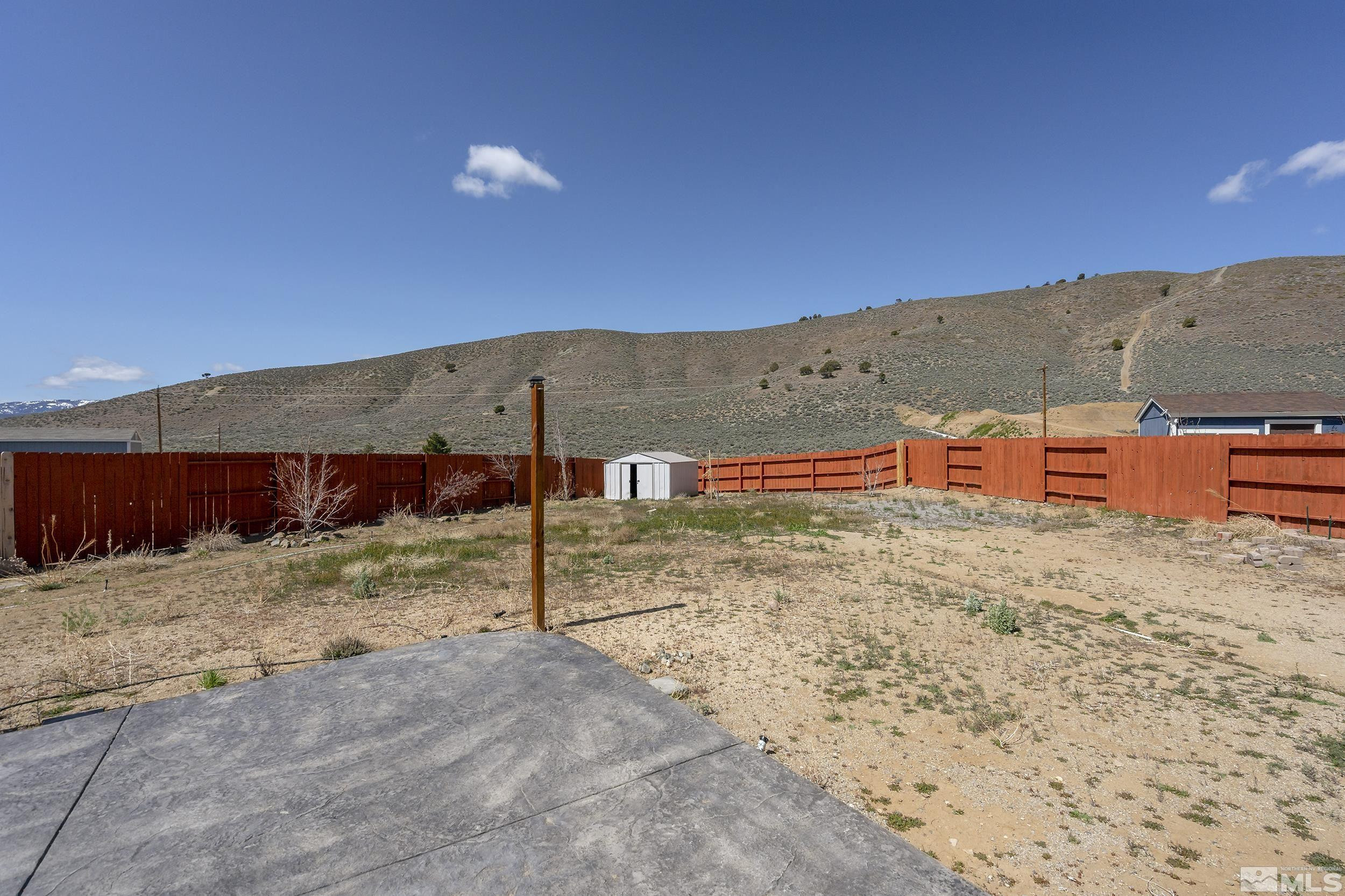 17940 Drift Creek Court Reno, NV 89508 - Photo 22 of 26 a view of a backyard