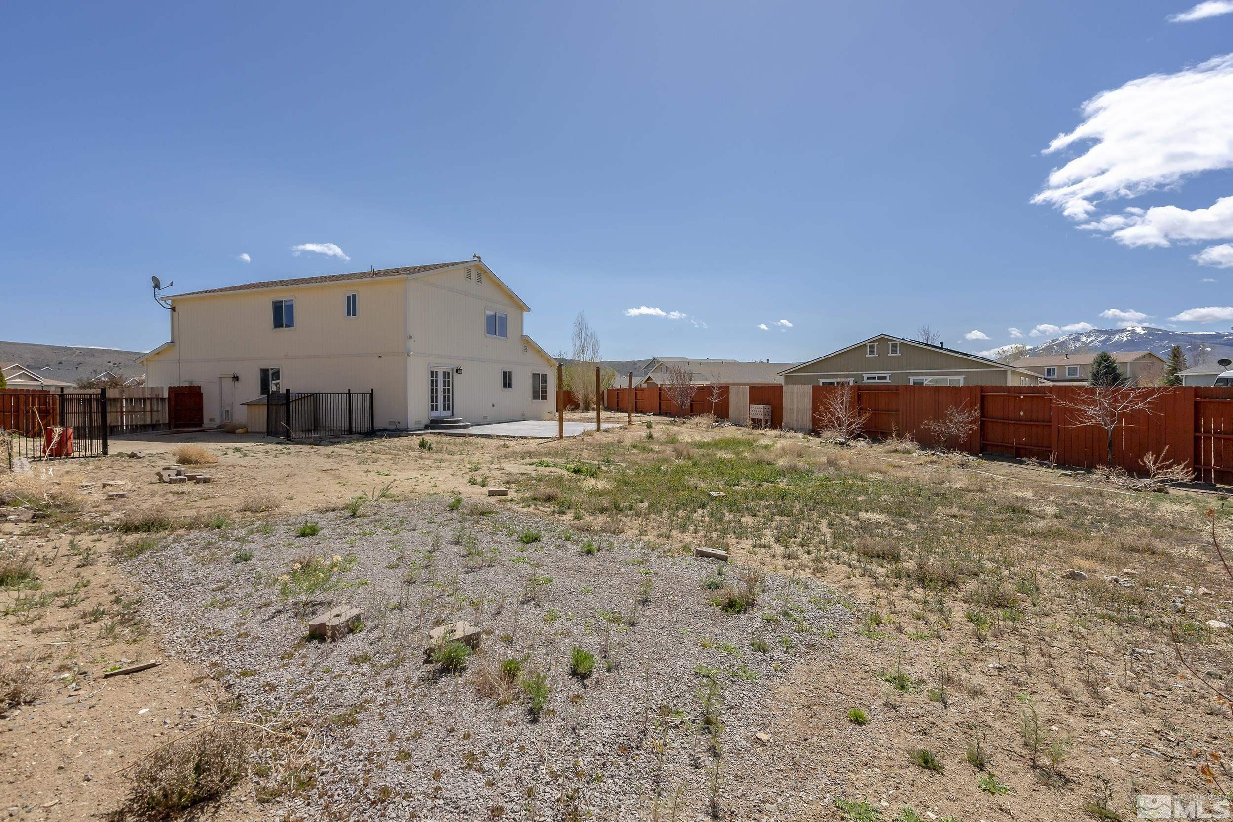 17940 Drift Creek Court Reno, NV 89508 - Photo 25 of 26 a view of a house with a yard