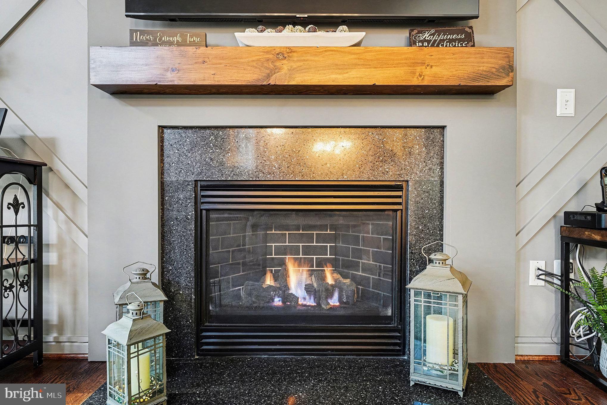6465 Colonial Village Loop Manassas, VA 20112 - Photo 16 of 39 a view of fireplace with wooden floor