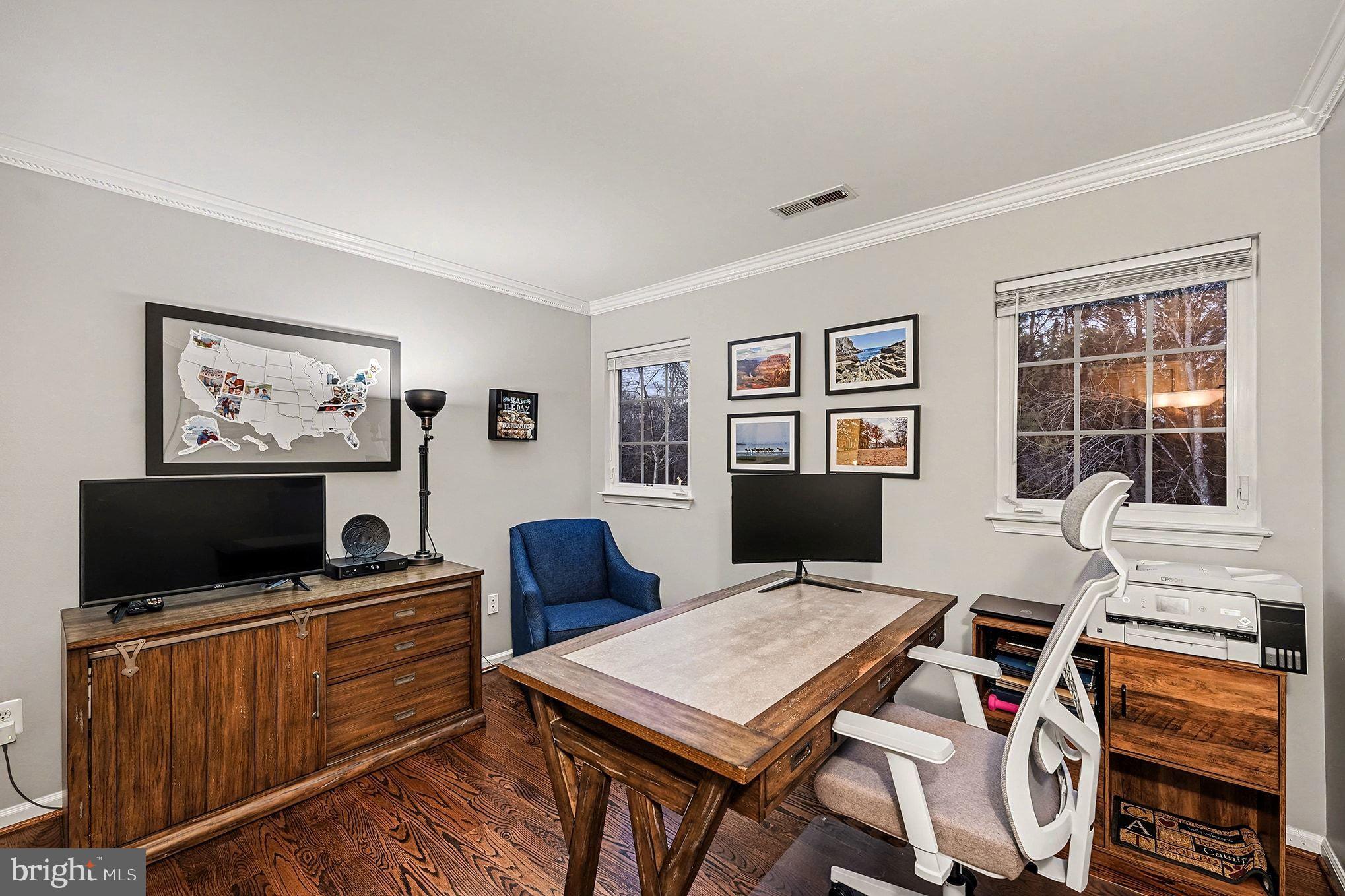 6465 Colonial Village Loop Manassas, VA 20112 - Photo 27 of 39 a view of a workspace with furniture window and wooden floor