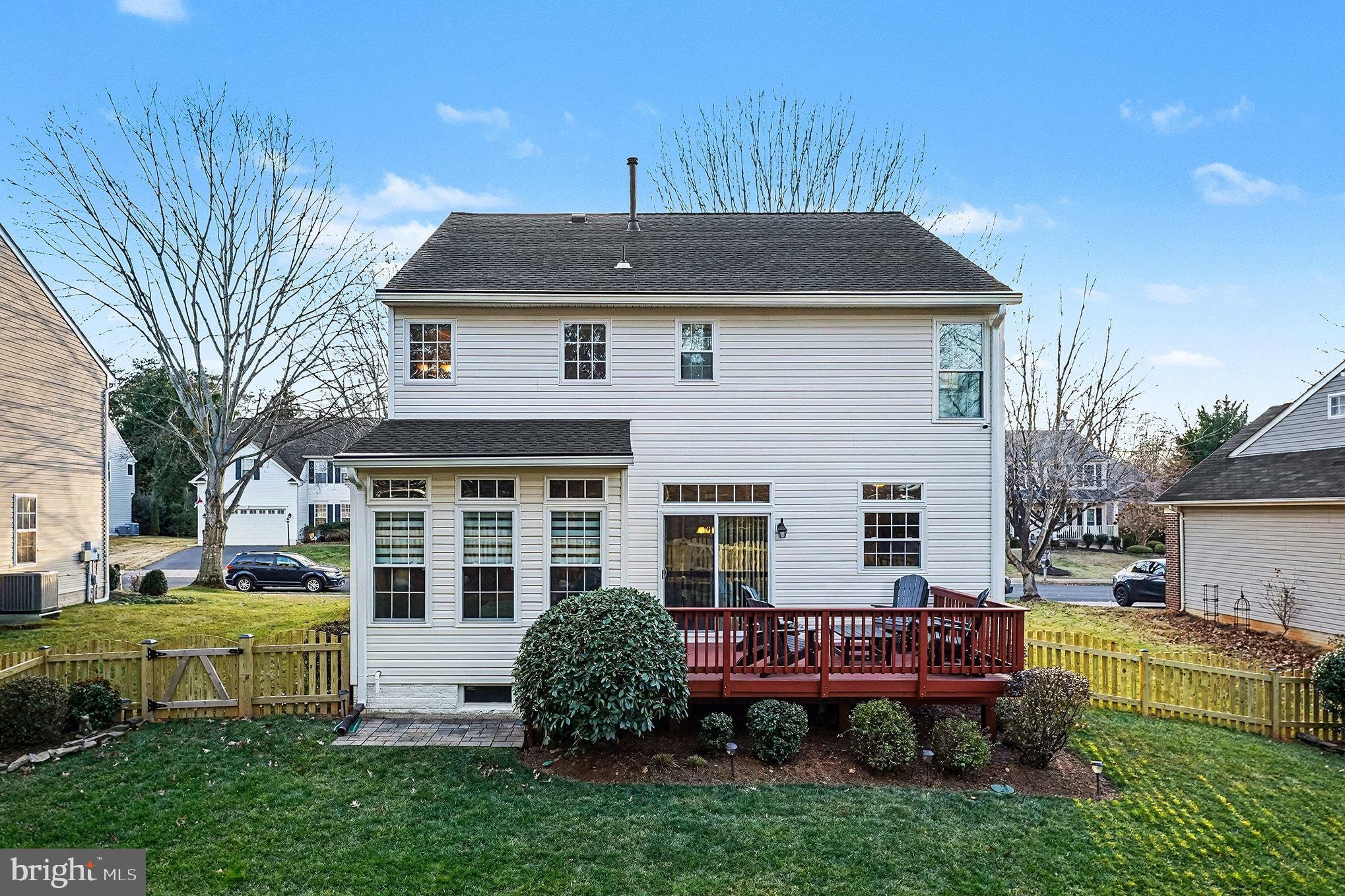 6465 Colonial Village Loop Manassas, VA 20112 - Photo 36 of 39 a front view of a house with a yard