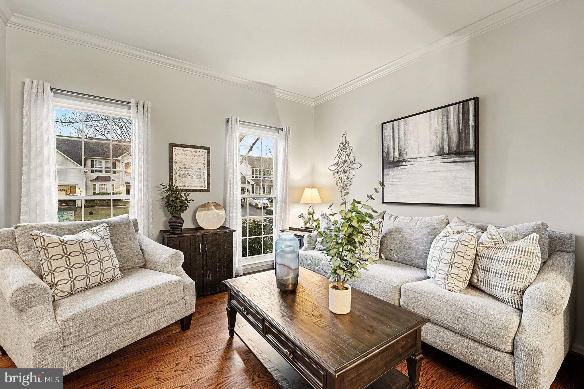 6465 Colonial Village Loop Manassas, VA 20112 - Photo 6 of 39 a living room with furniture and wooden floor