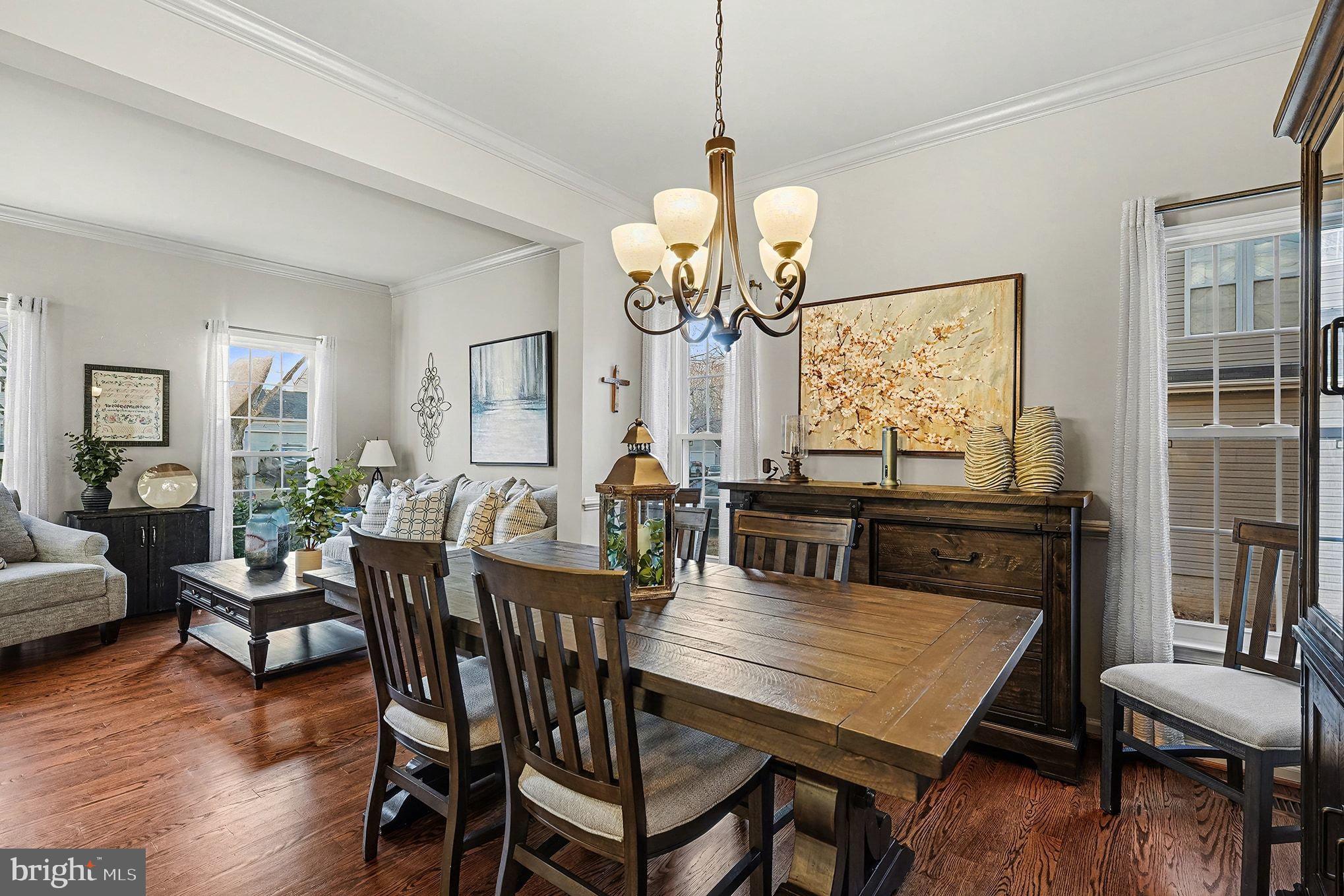 6465 Colonial Village Loop Manassas, VA 20112 - Photo 10 of 39 a view of a dining room with furniture window and wooden floor