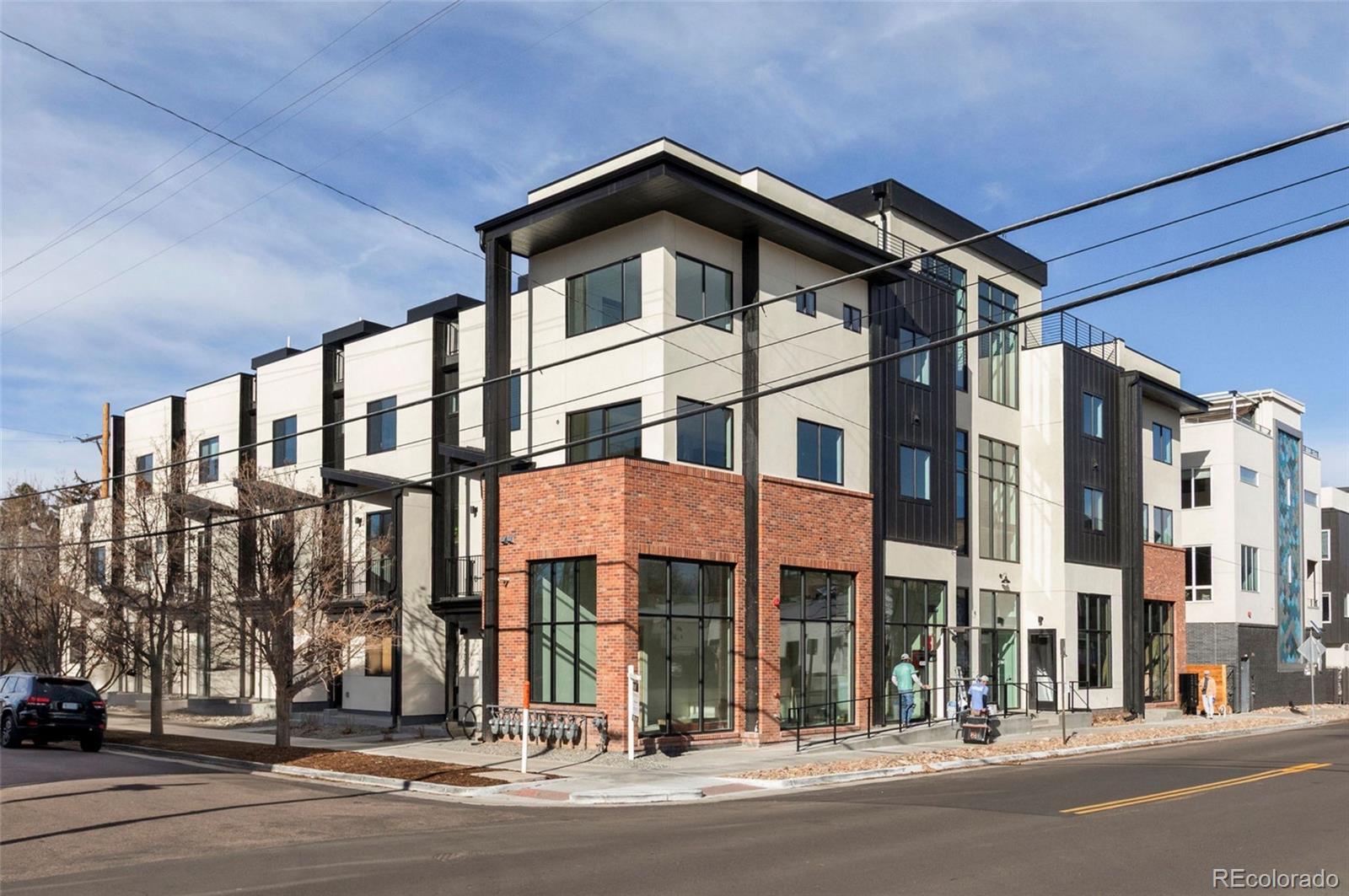 4511 Tennyson Street Denver, CO 80212 - Photo 2 of 34 a view of a building and a street