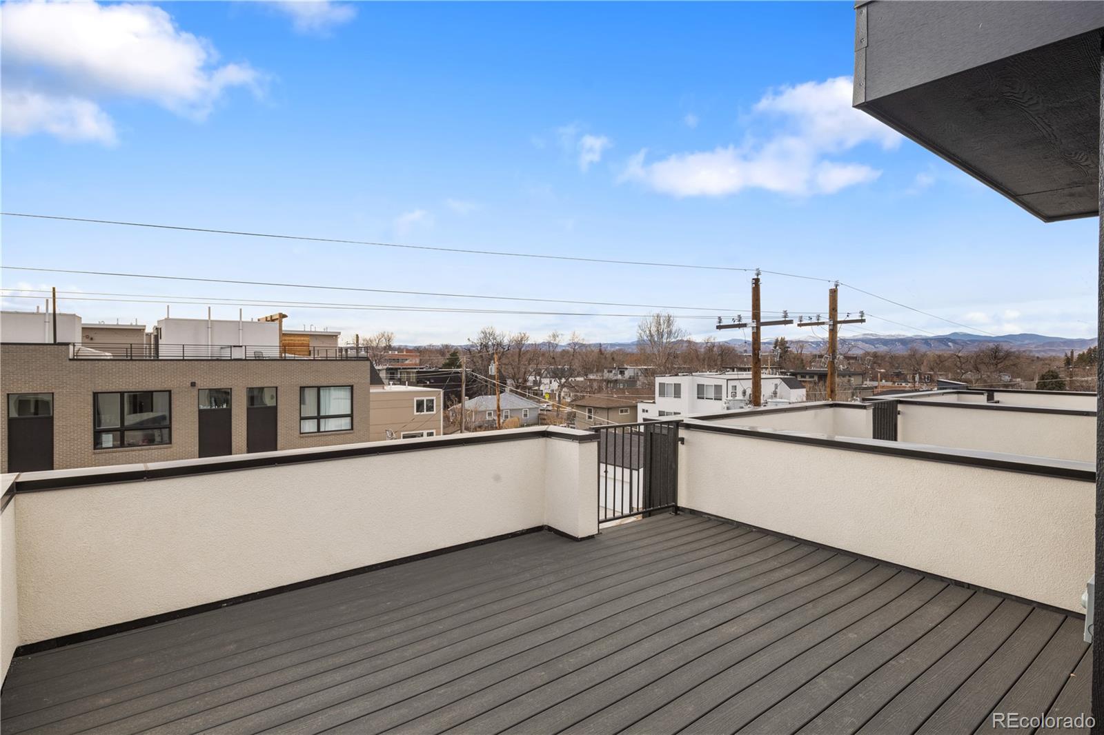 4511 Tennyson Street Denver, CO 80212 - Photo 32 of 34 a view of a terrace with a lake view