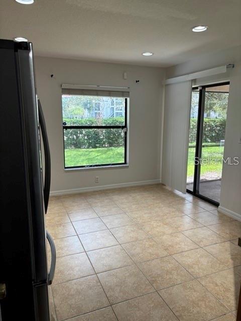 2417 Hibiscus Bay Lane Brandon, FL 33511 - Photo 11 of 36 a view of an empty room with a window
