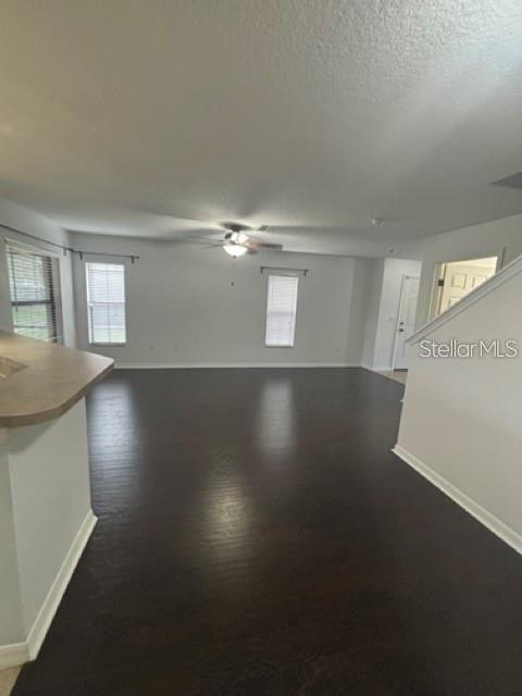 2417 Hibiscus Bay Lane Brandon, FL 33511 - Photo 15 of 36 an empty room with wooden floor and windows
