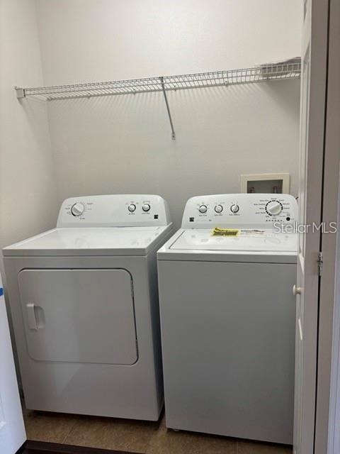 2417 Hibiscus Bay Lane Brandon, FL 33511 - Photo 19 of 36 a utility room with dryer and washer