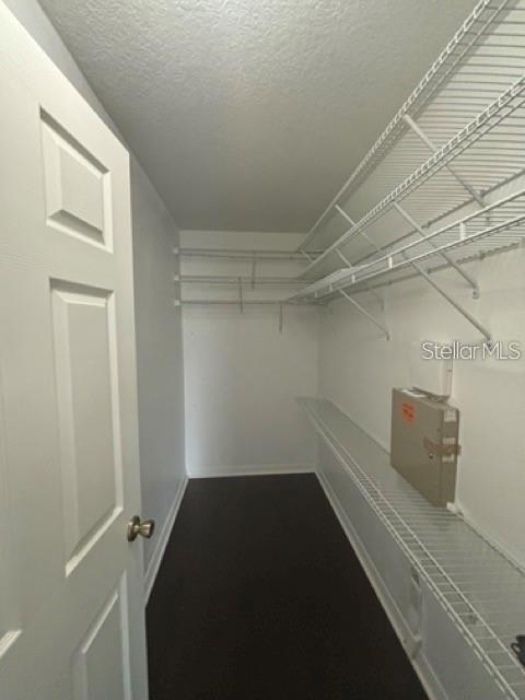2417 Hibiscus Bay Lane Brandon, FL 33511 - Photo 24 of 36 a view of storage and utility room with racks on the wall