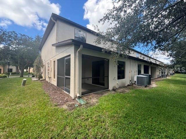 2417 Hibiscus Bay Lane Brandon, FL 33511 - Photo 33 of 36 a view of a house with a yard and sitting area