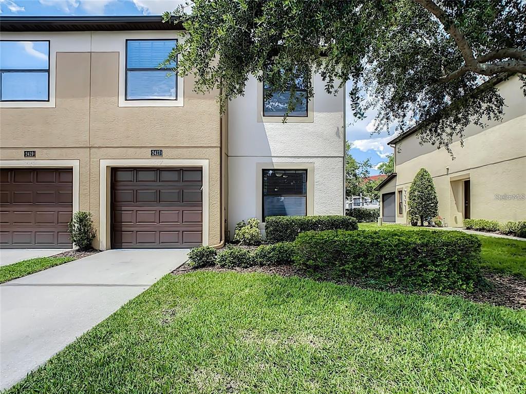 2417 Hibiscus Bay Lane Brandon, FL 33511 - Photo 36 of 36 a front view of a house with garden