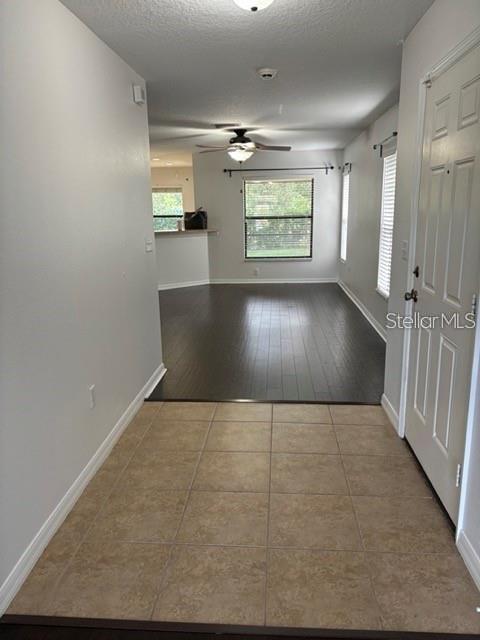 2417 Hibiscus Bay Lane Brandon, FL 33511 - Photo 5 of 36 wooden floor in an empty room with a window