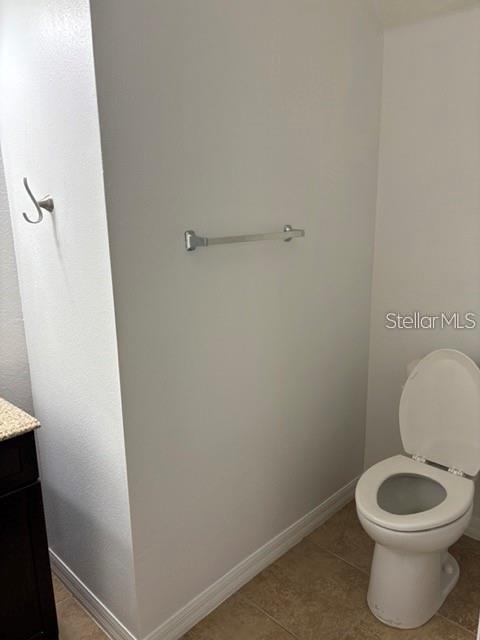 2417 Hibiscus Bay Lane Brandon, FL 33511 - Photo 10 of 36 a white toilet sitting next to a shower