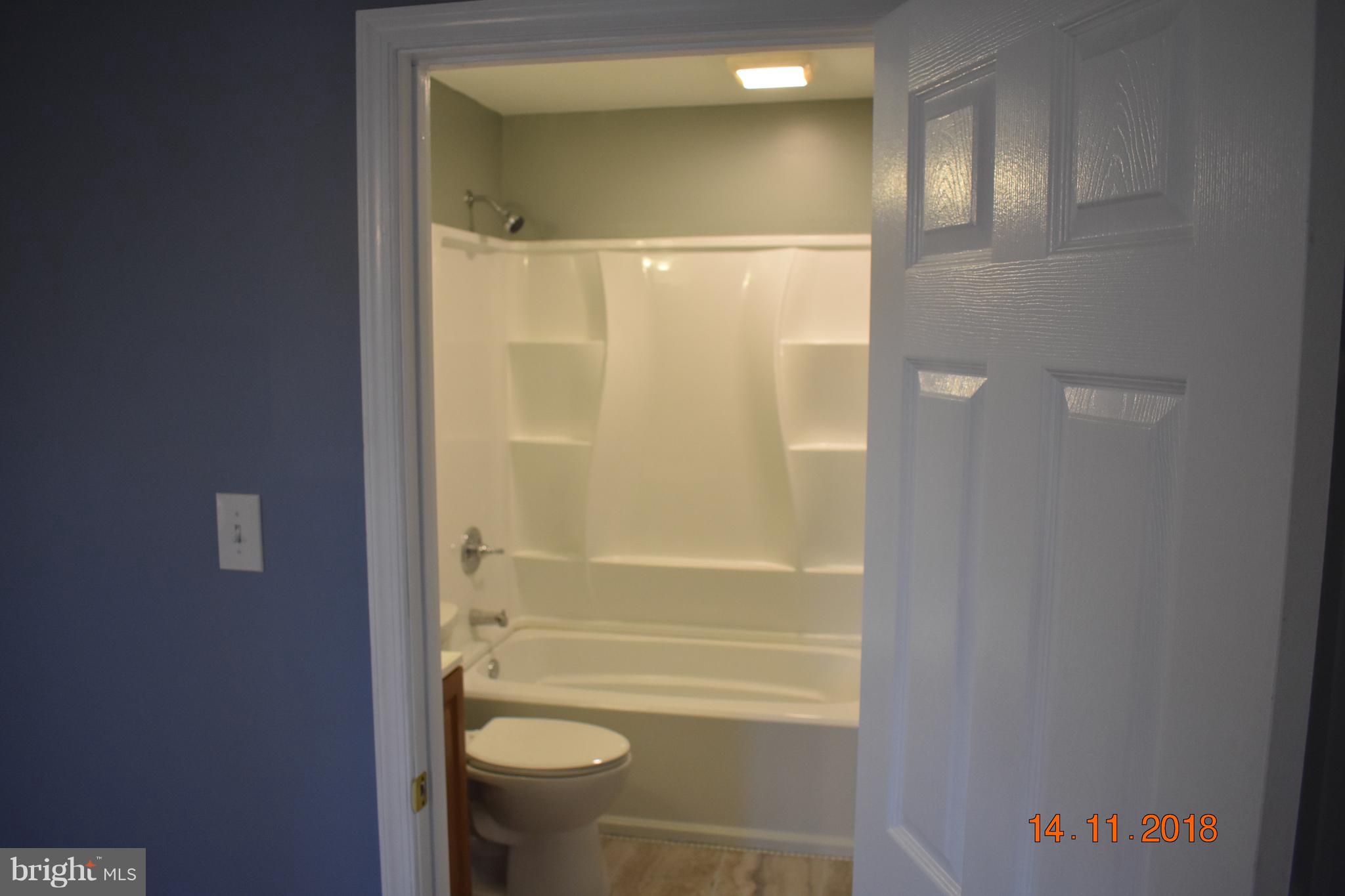 1905 Ridgewick Road Glen Burnie, MD 21061 - Photo 12 of 25 1st floor Master Bedroom additional door into bath