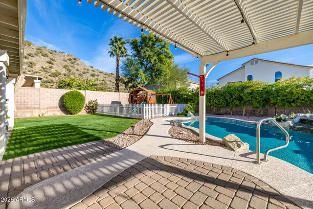 a view of a garden with a small cabin
