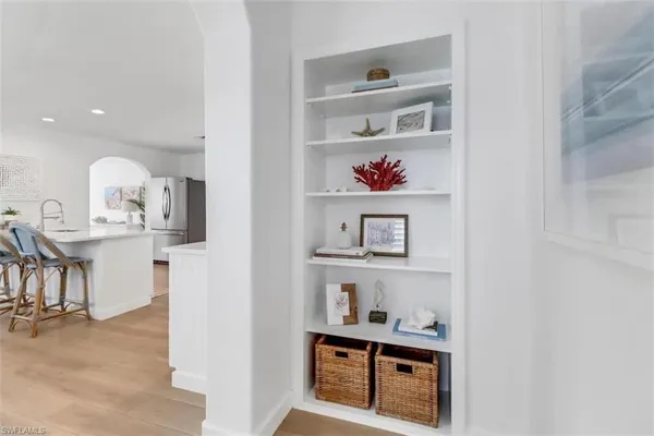 a room with toys and dresser
