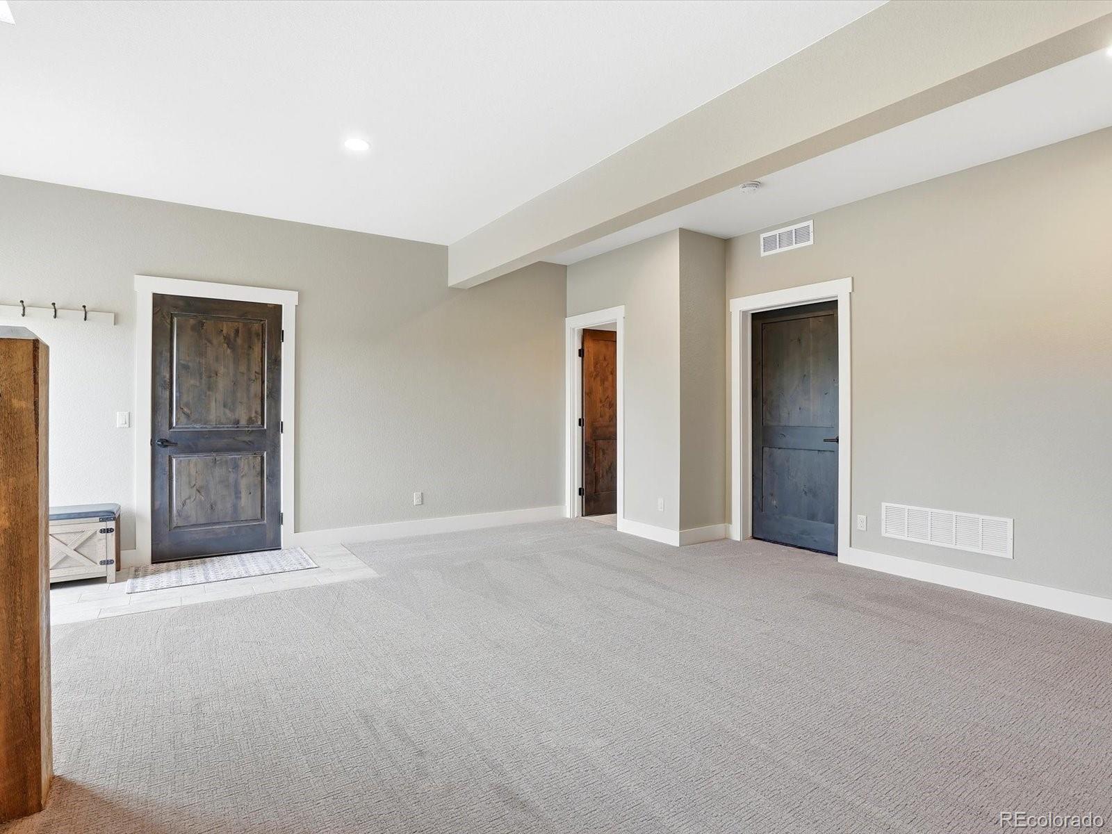 7333 Plowsher Way Morrison, CO 80465 - Photo 25 of 36 a view of an empty room with a window