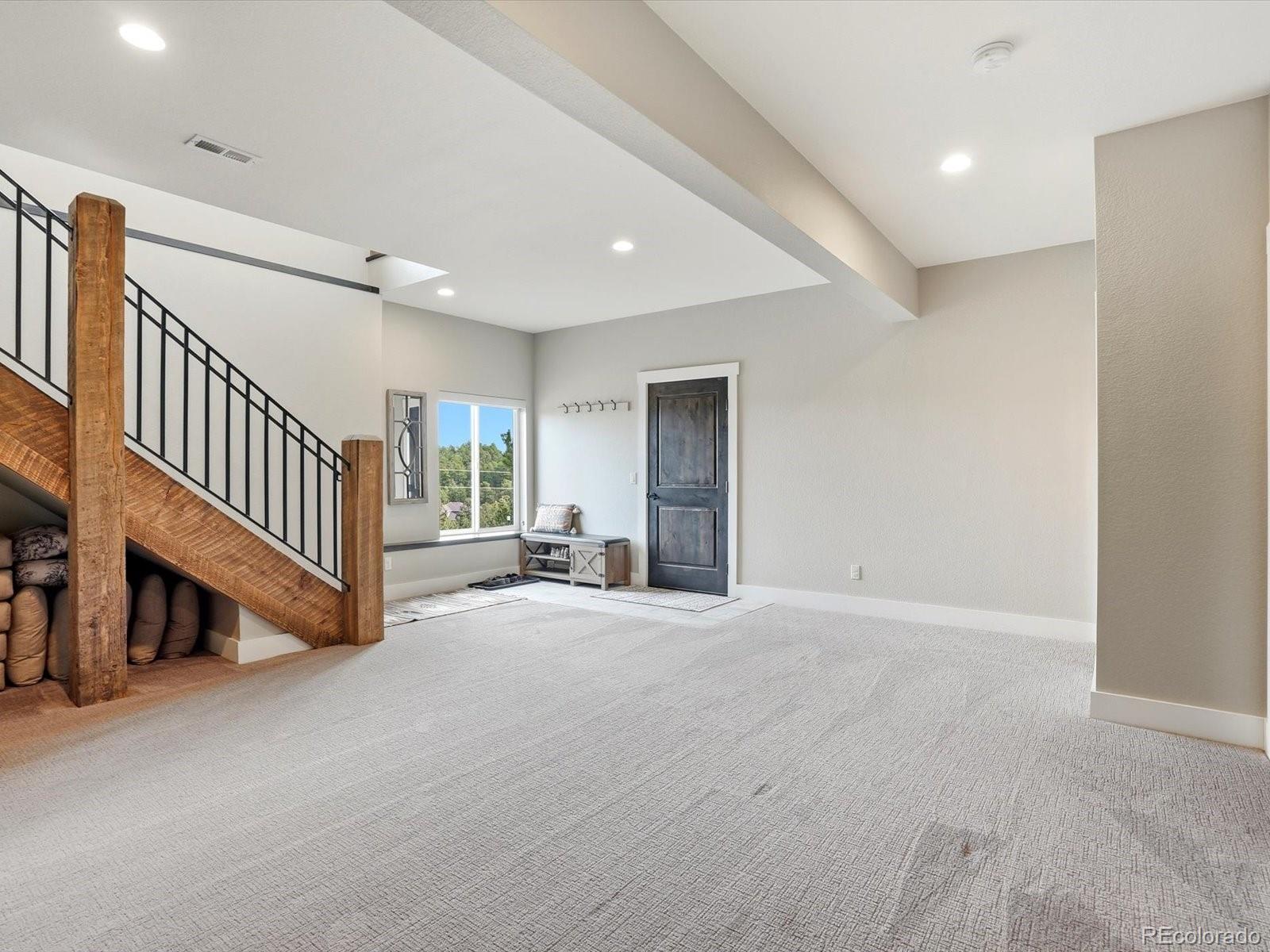 7333 Plowsher Way Morrison, CO 80465 - Photo 26 of 36 a view of an empty room with a window