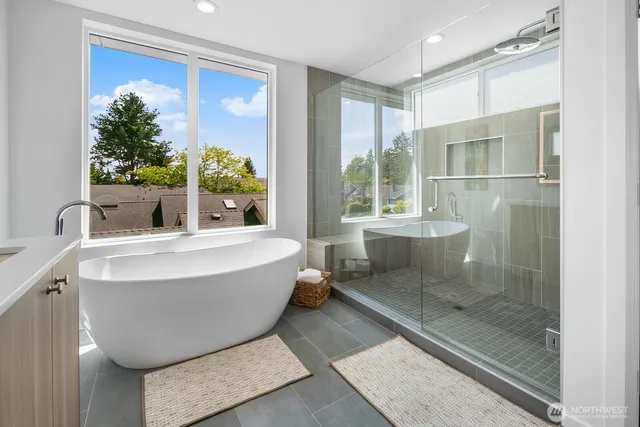 a bathroom with a bathtub and sink