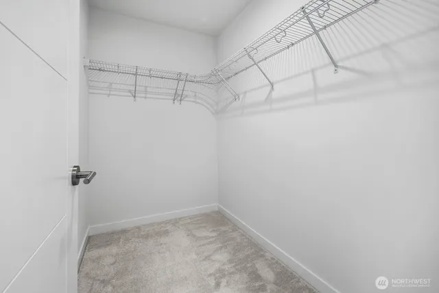 a view of a room with racks on the wall