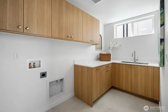 a kitchen with cabinets and white appliances