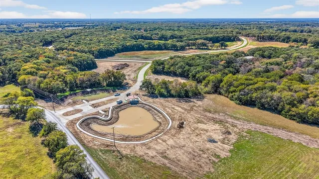 a view of a swimming pool with a yard and mountain view