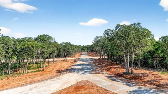 a view of a backyard of a house