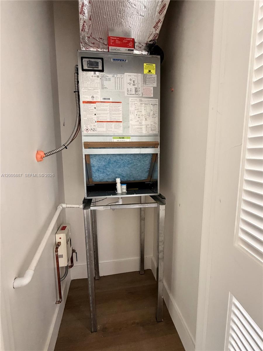 1904 Southwest 17th Avenue, Unit 8 Miami, FL 33145 - Photo 10 of 11 a utility room with dryer and washer