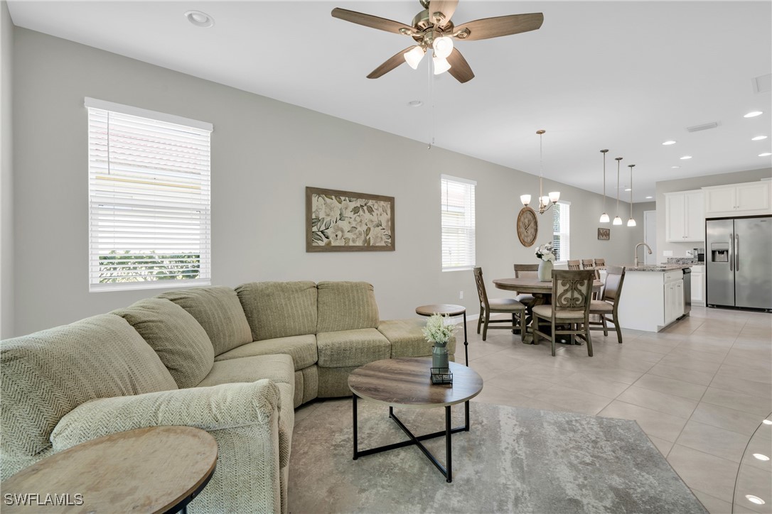 2125 Summersweet Drive Alva, FL 33920 - Photo 18 of 32 a living room with furniture and a large window