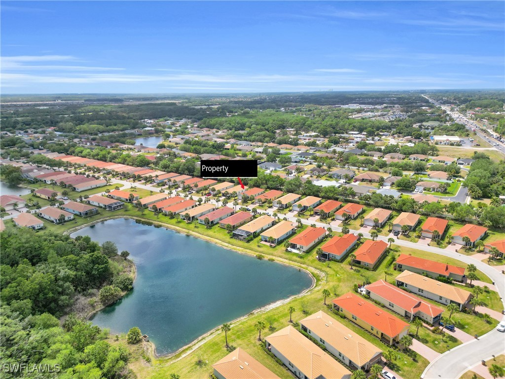 2125 Summersweet Drive Alva, FL 33920 - Photo 5 of 32 an aerial view of residential houses with outdoor space