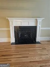 a view of a livingroom with a fireplace