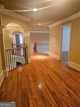 a view of entryway with wooden floor