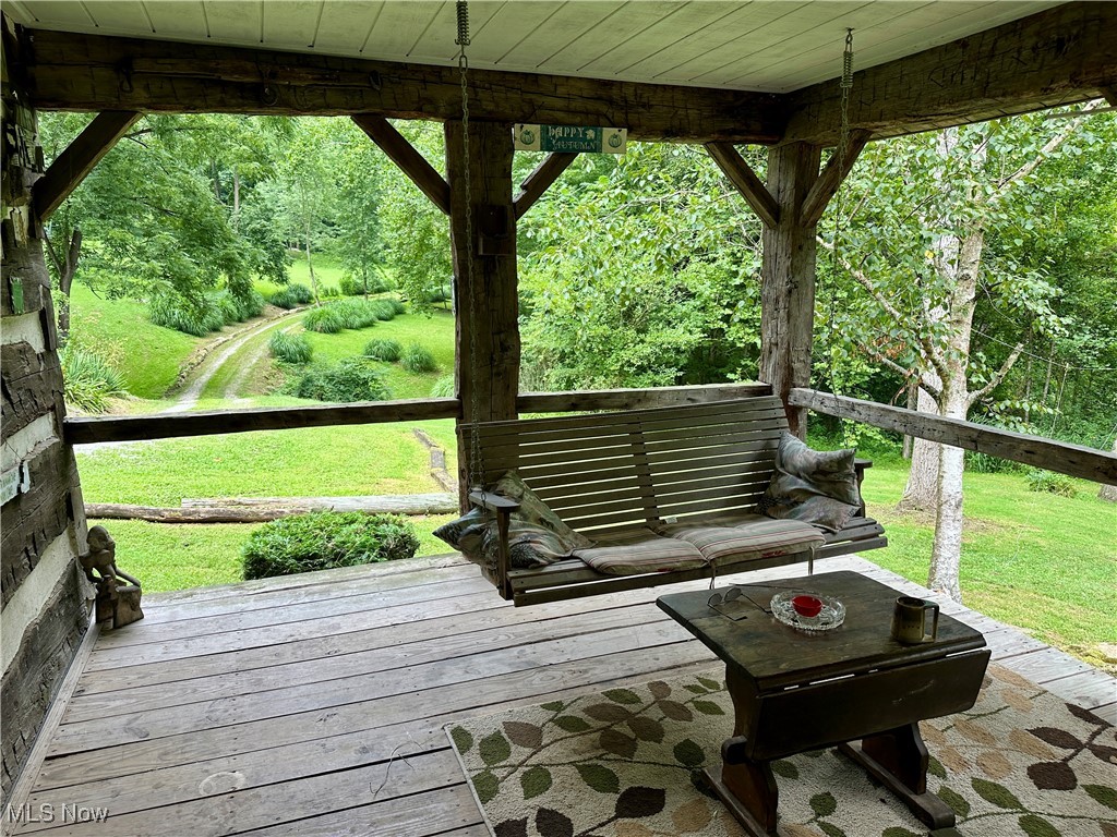 325 North Fork Road New Matamoras, OH 45767 - Photo 46 of 50 Wooden deck featuring a lawn
