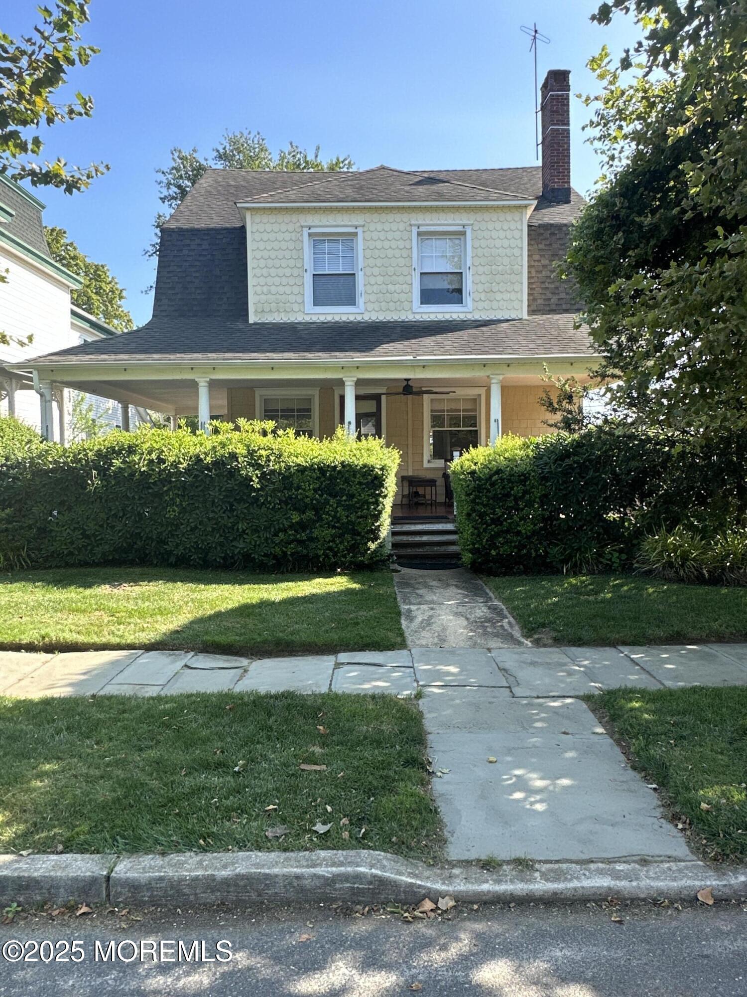319 Jersey Avenue Spring Lake, NJ 07762 - Photo 1 of 21 a front view of a house with a yard