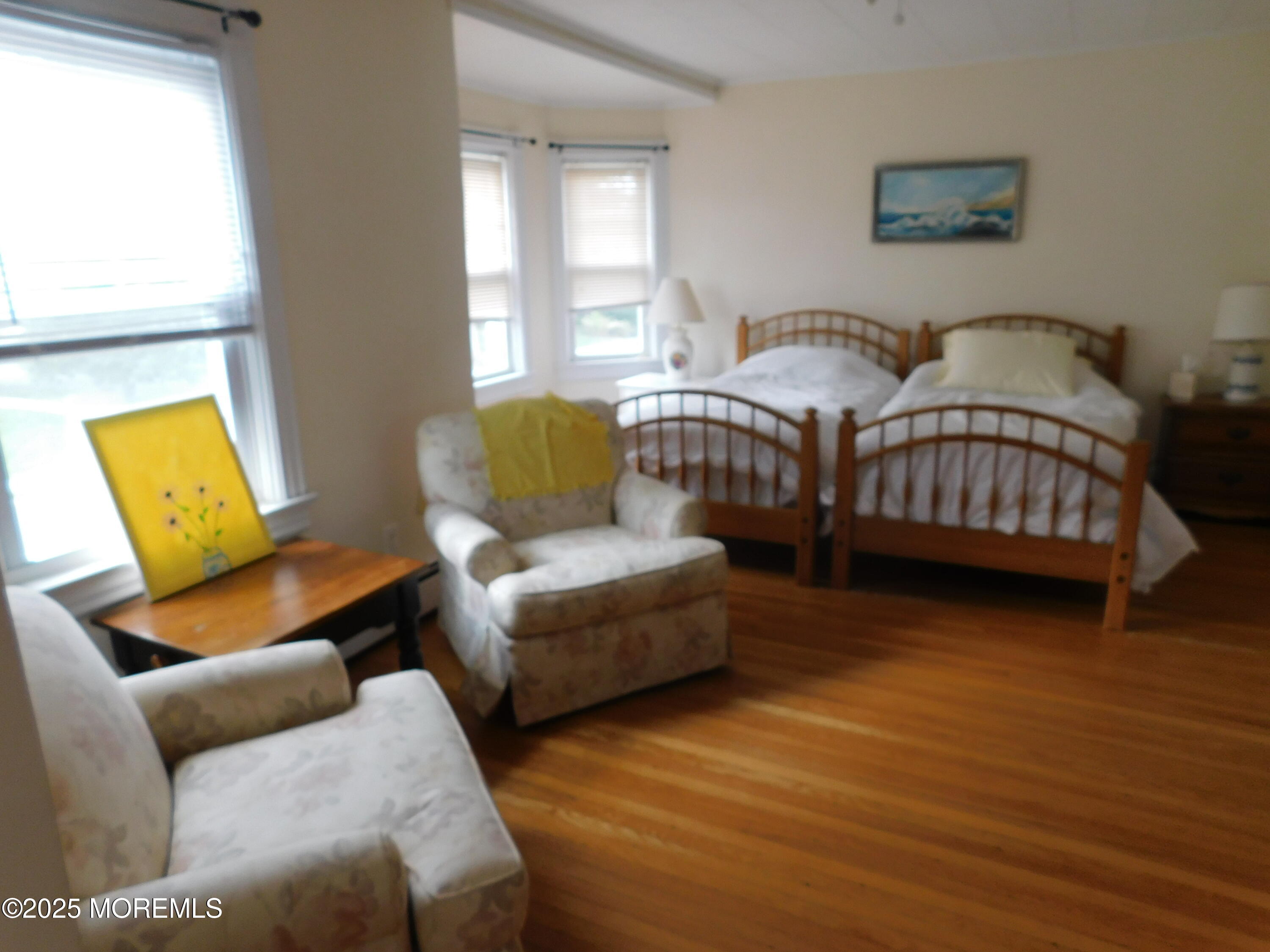 319 Jersey Avenue Spring Lake, NJ 07762 - Photo 15 of 21 a bedroom with furniture and a window