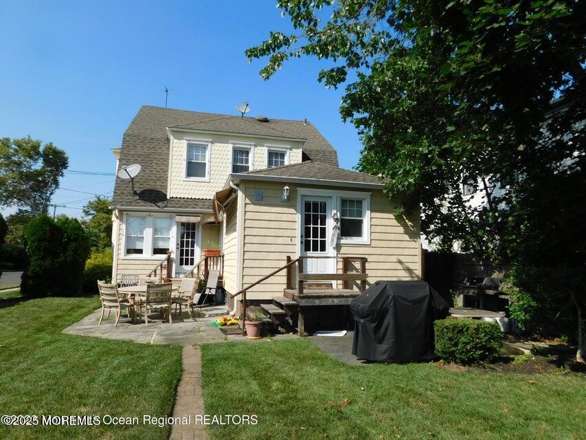 319 Jersey Avenue Spring Lake, NJ 07762 - Photo 2 of 21 a view of a house with a yard porch and sitting area
