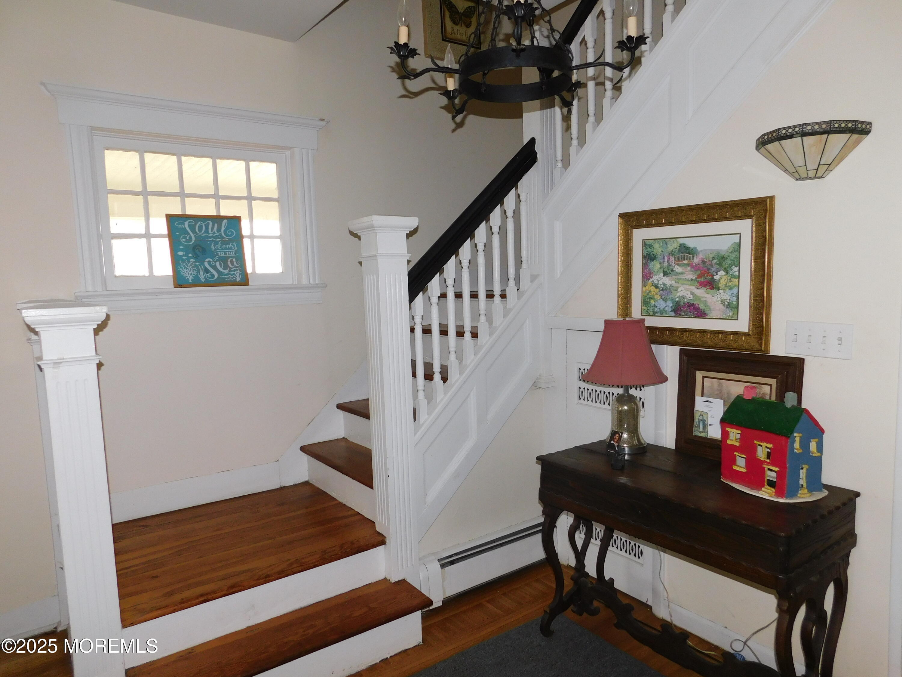319 Jersey Avenue Spring Lake, NJ 07762 - Photo 5 of 21 a view of entryway and hall with wooden floor